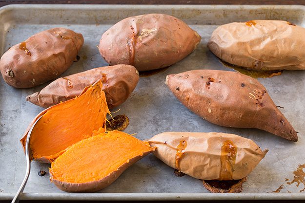 Browned Butter Sweet Potato Casserole Showing how to make sweet potato casserole. Staring by baking sweet potatoes.