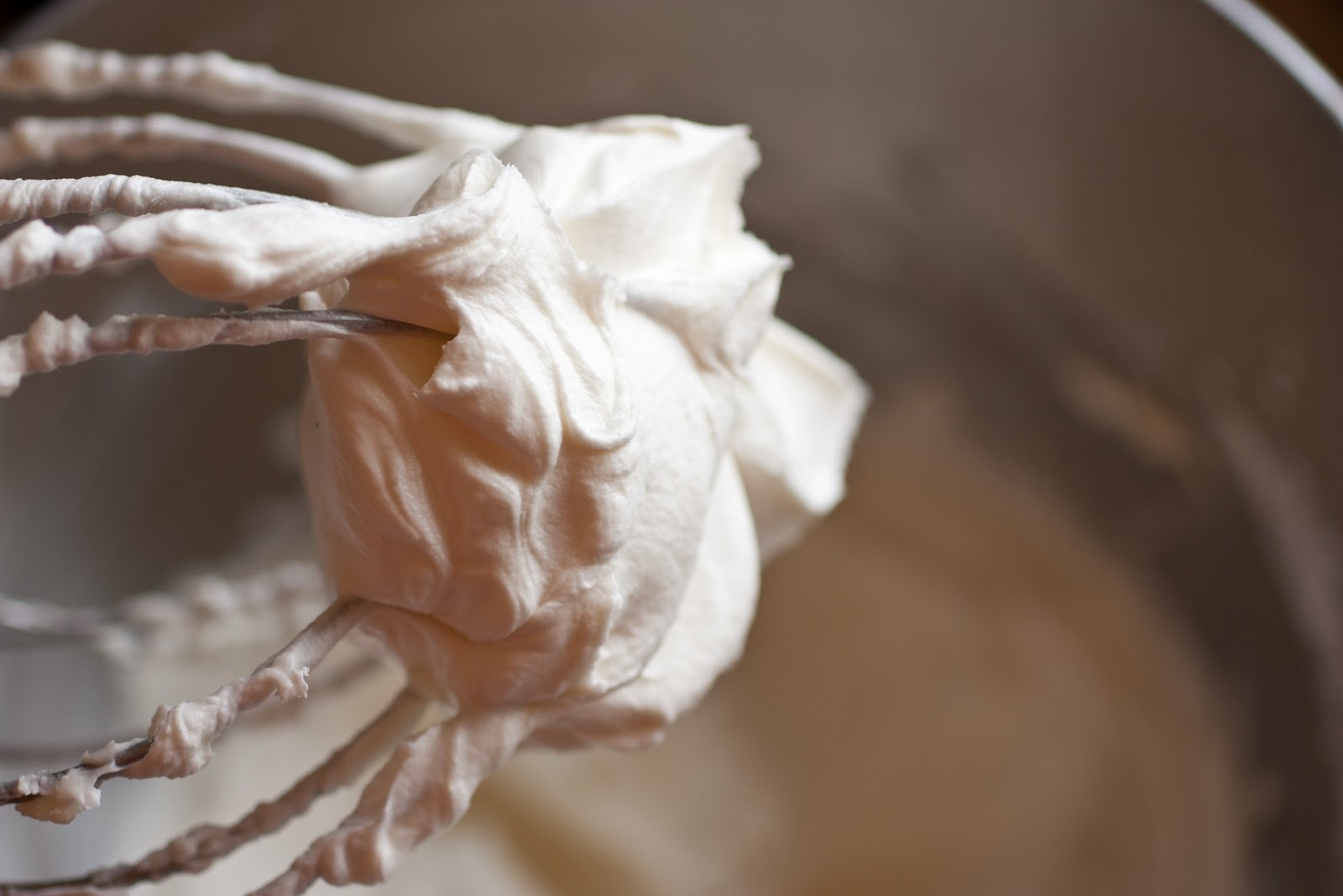 Buttercream Frosting buttercream frosting on the end of a whisk