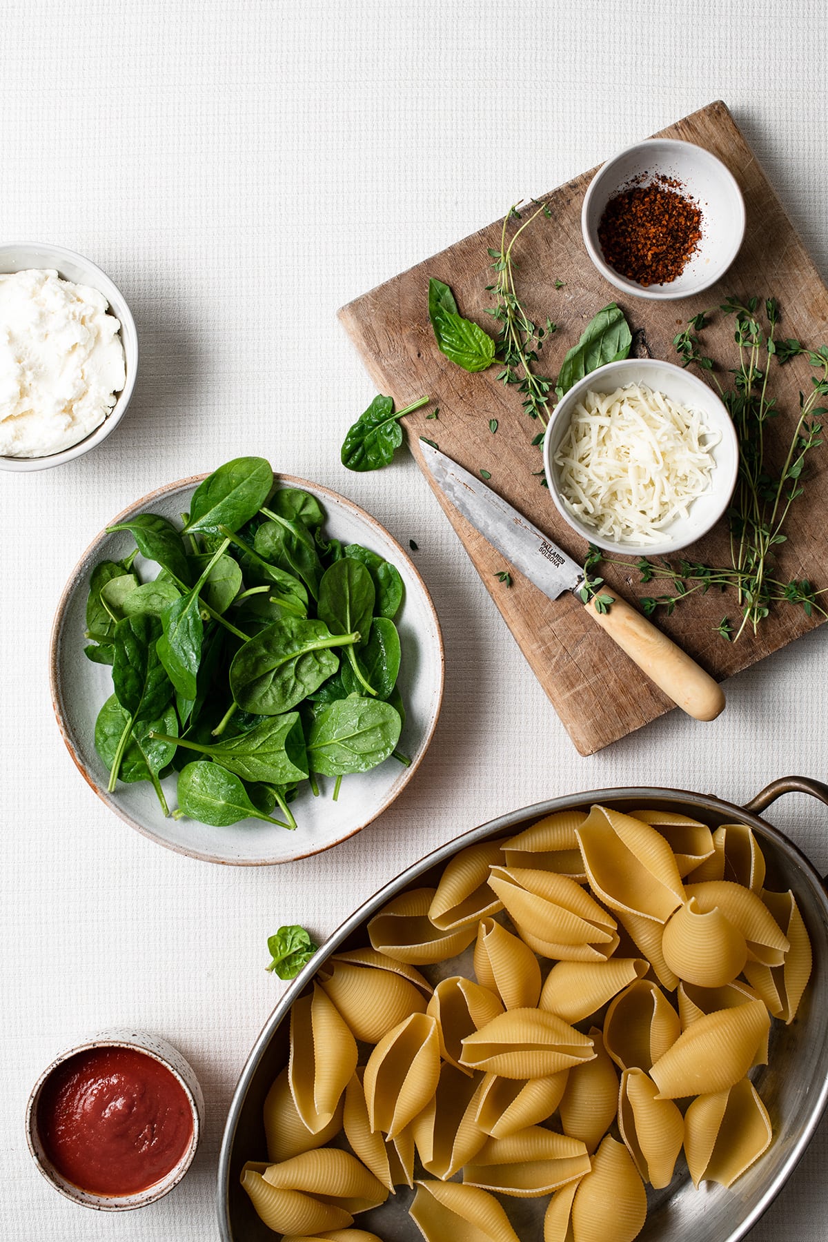 Spinach and Cheese Stuffed Shells Image of ingredients needed to make stuffed shells.