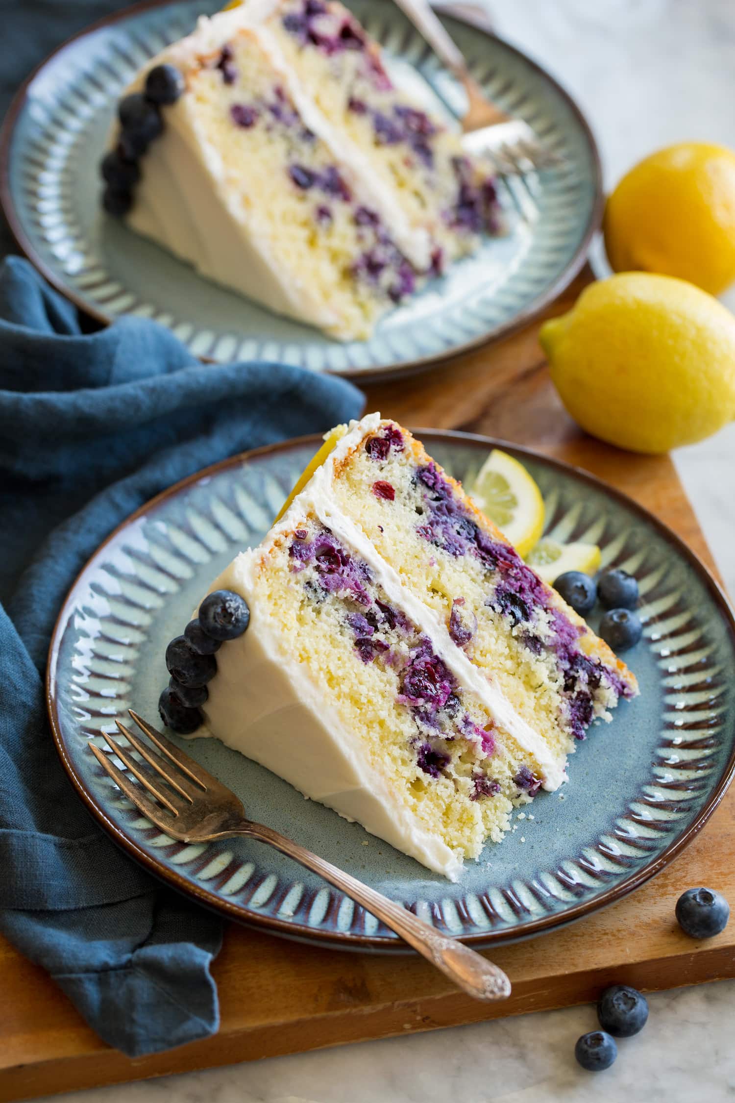 Lemon Blueberry Cake Two slices of homemade blueberry and lemon cake.