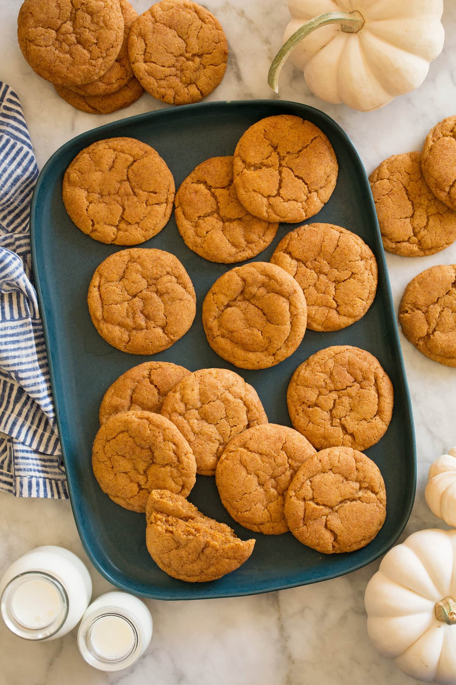 Pumpkin Snickerdoodle Cookies Overhead photo of pumpkin snickerdoodles on a blue rectangular platter.