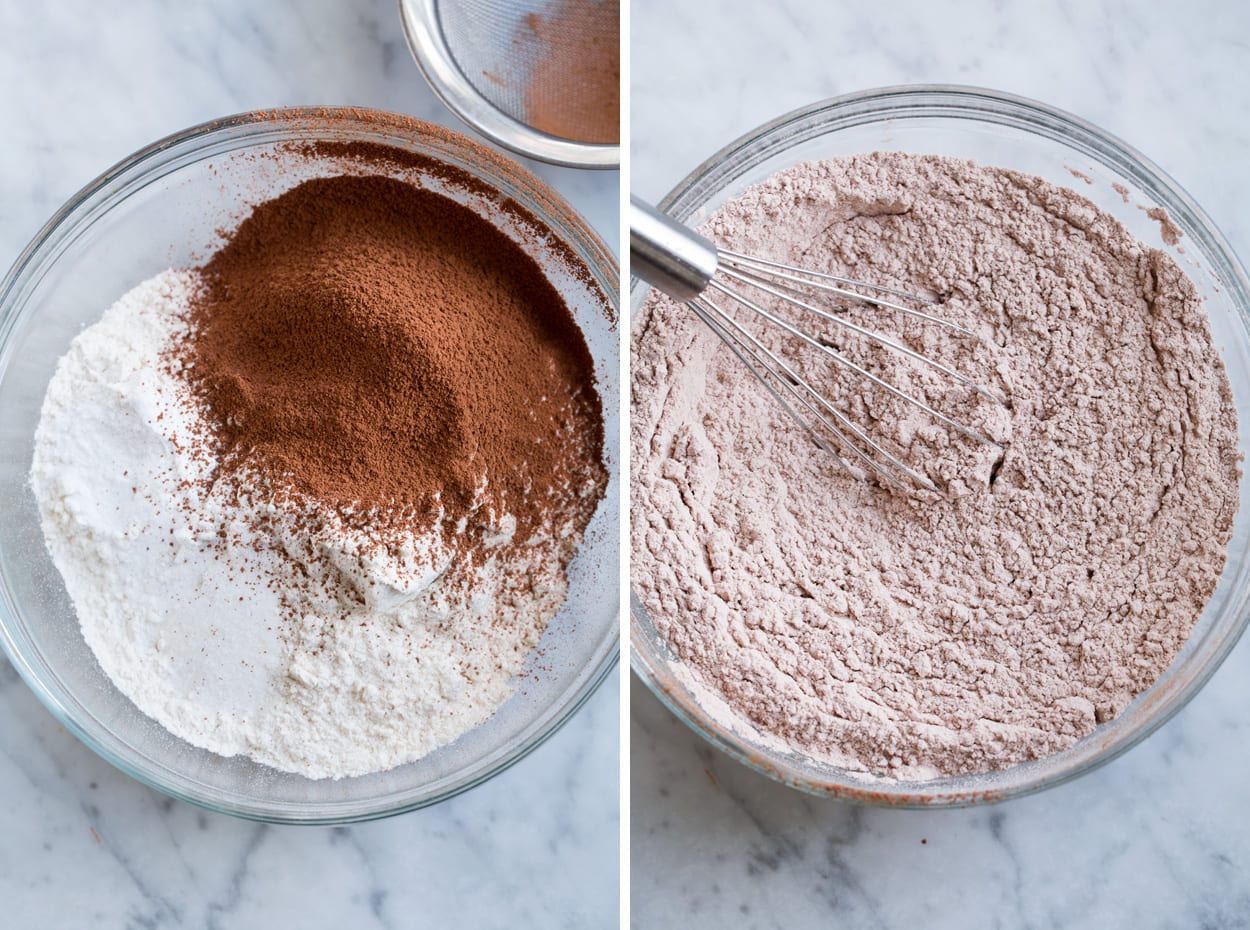 The BEST Red Velvet Cake! Soft, moist and perfectly fluffy! Showing how to prep flour mixture. Whisking flour, cocoa, baking soda and salt in a glass mixing bowl.