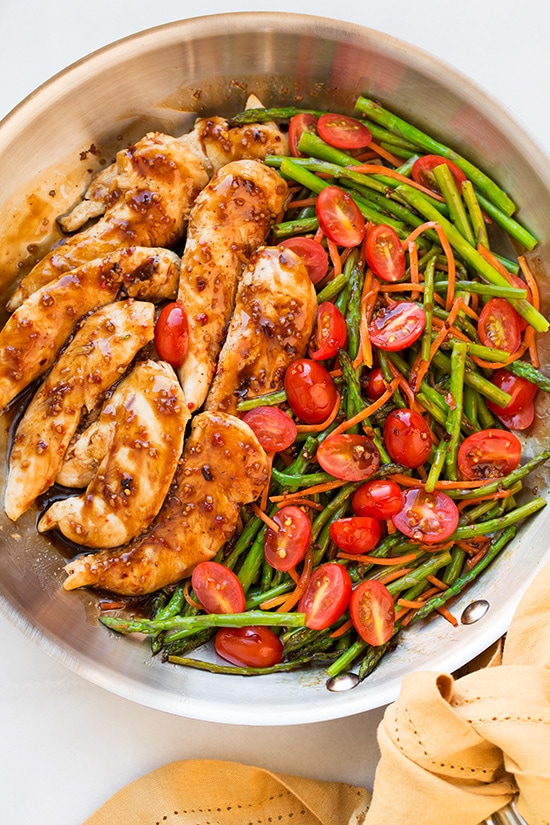 One Pan Balsamic Chicken. An easy and delicious meal using simple ingredients packed with flavor. This is a a 20 minute meal that is sure to please! | Balsamic Chicken Recipe | Easy Chicken Recipe | Chicken Dinner | #cookingclassy #chicken #balsamic #dinner One Pan Balsamic Chicken with asparagus and tomatoes