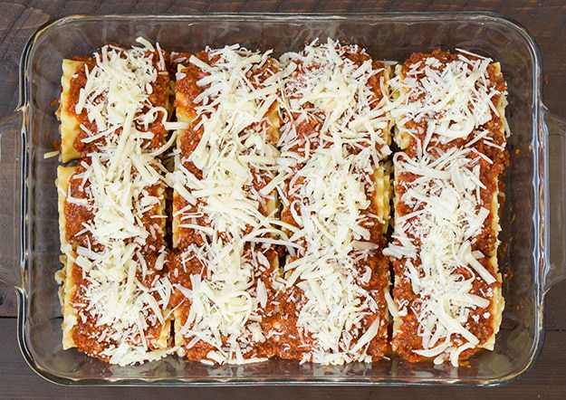 Lasagna Roll Ups. Not only look incredible but taste incredible. There's served in individual portions and are great for freezing too. | Lasagna Recipes | Easy Lasagna | #cookingclassy #lasagna #pasta #rollups Mozzarella cheese sprinkled on top of Lasagna Roll Ups