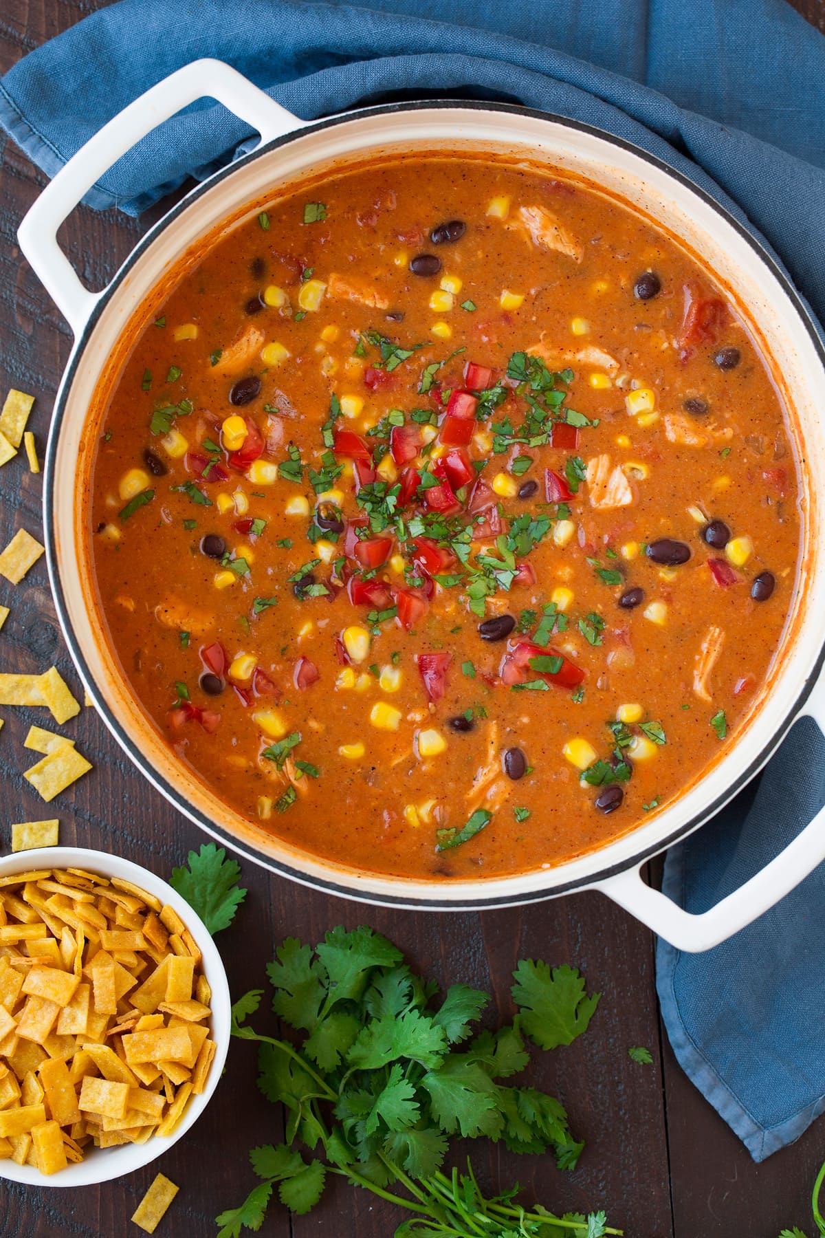 Cheesy Chicken Enchilada Soup chicken enchilada soup in a white pot