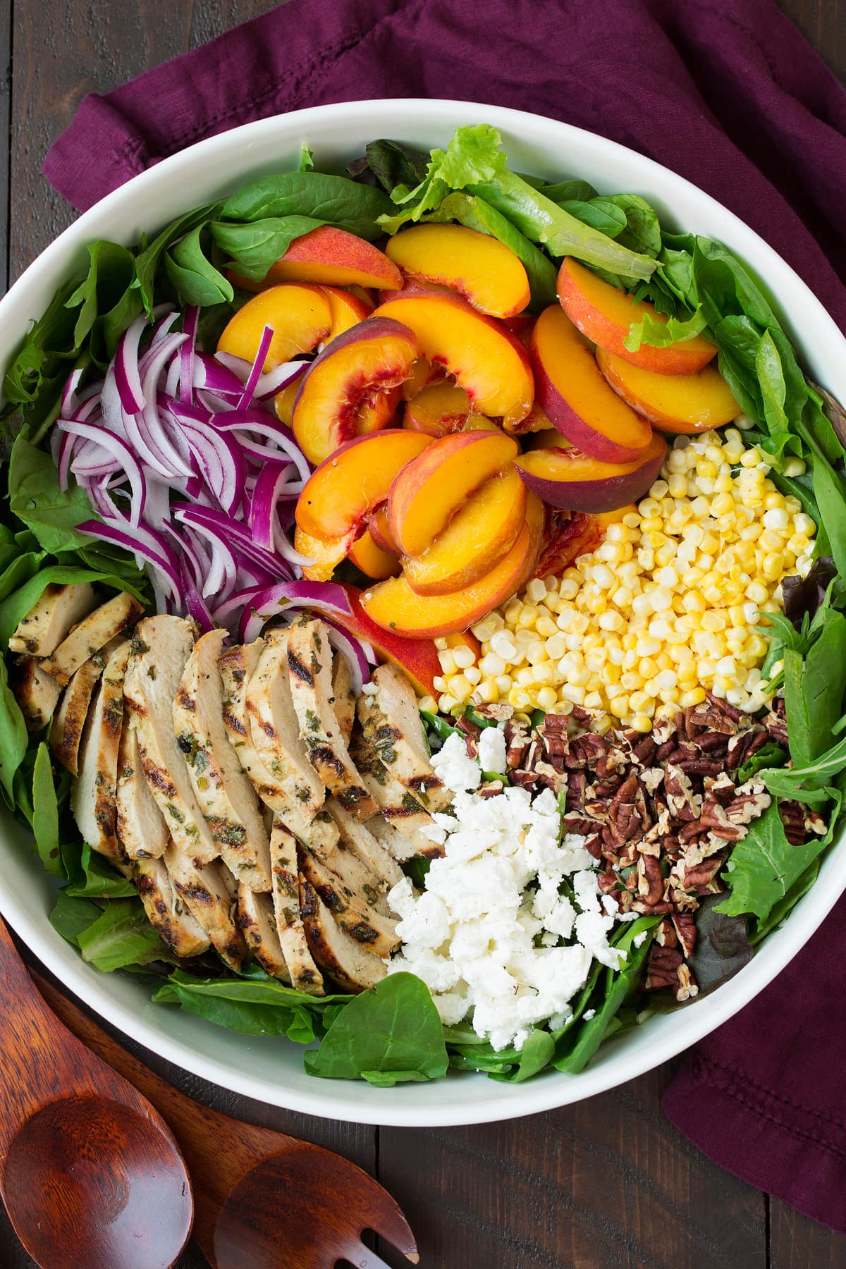 Peach Salad Peach salad ingredients in bowl before tossing.
