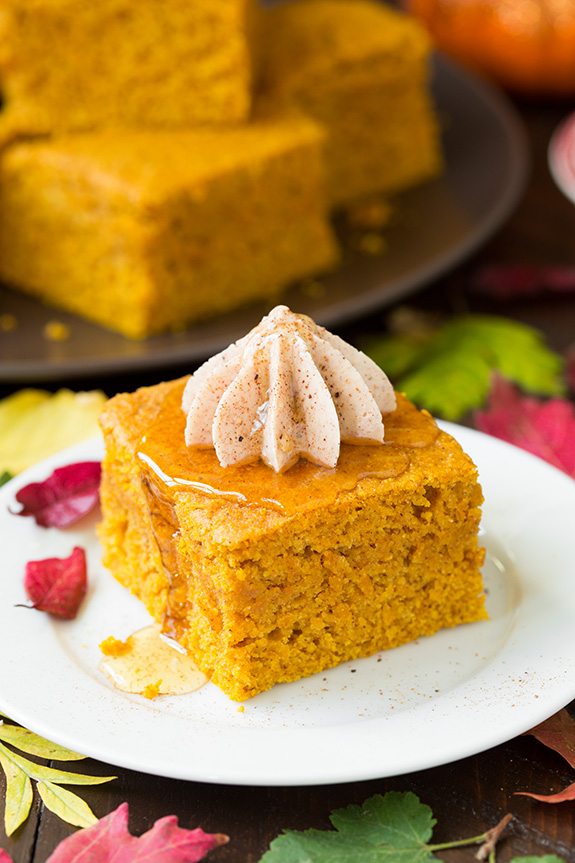 Pumpkin Cornbread Slice of pumpkin cornbread topped with piped cinnamon honey butter.