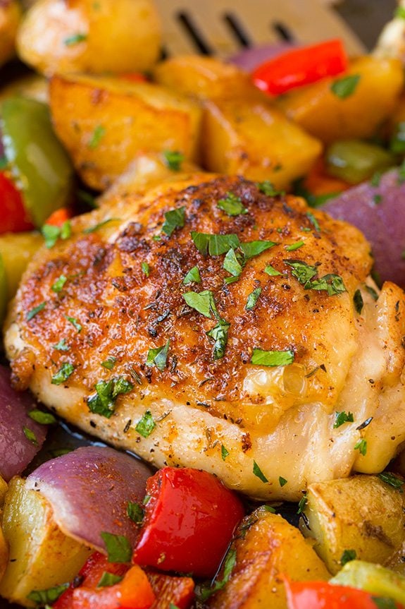 One Pan Cajun Chicken Dinner on baking sheet
