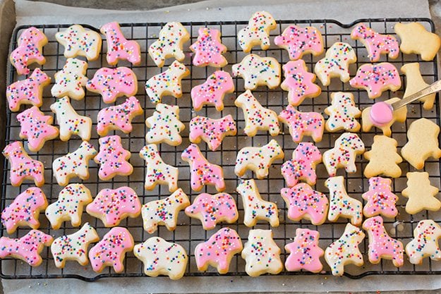 decorated circus animal cookies on wire rack
