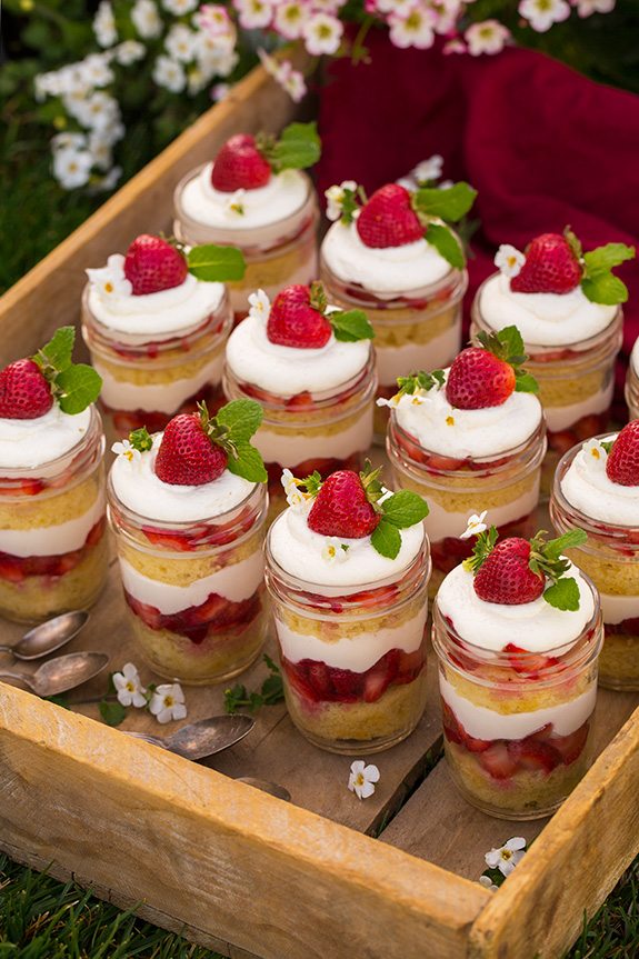 Strawberry Shortcake Trifles in wooden tray with spoons