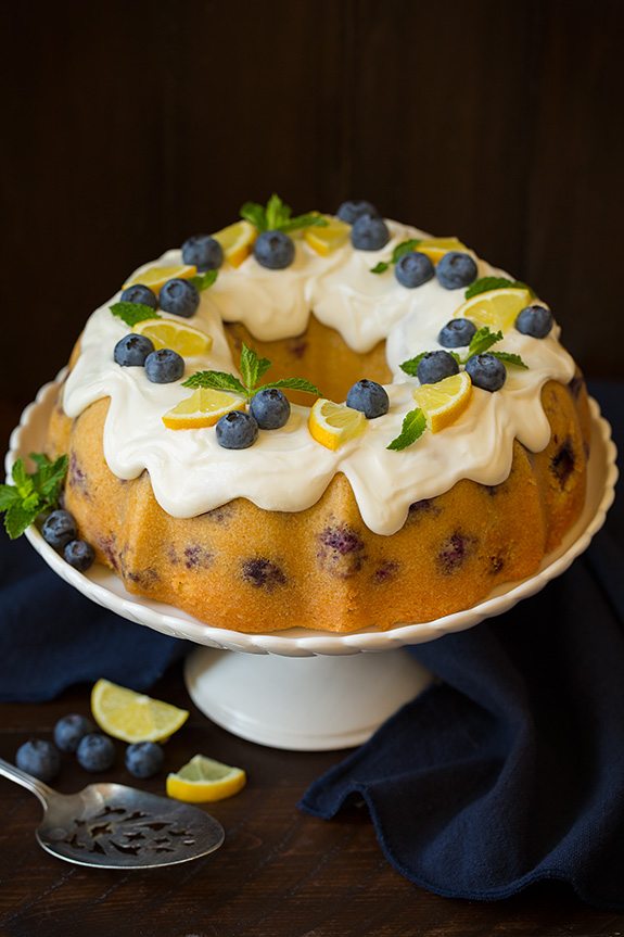 Lemon Blueberry Bundt Cake with Lemon Cream Cheese Icing on cake stand