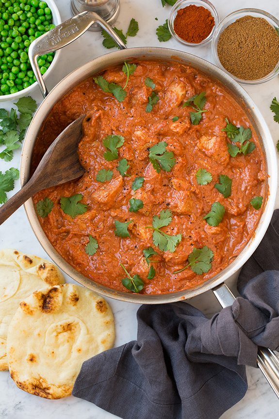 Chicken Tikka Masala Chicken Tikka Masala in pan garnished with cilantro