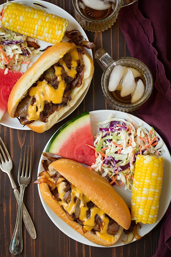 Brats with Caramelized Onions and Cheddar Cheese Sauce | Cooking Classy