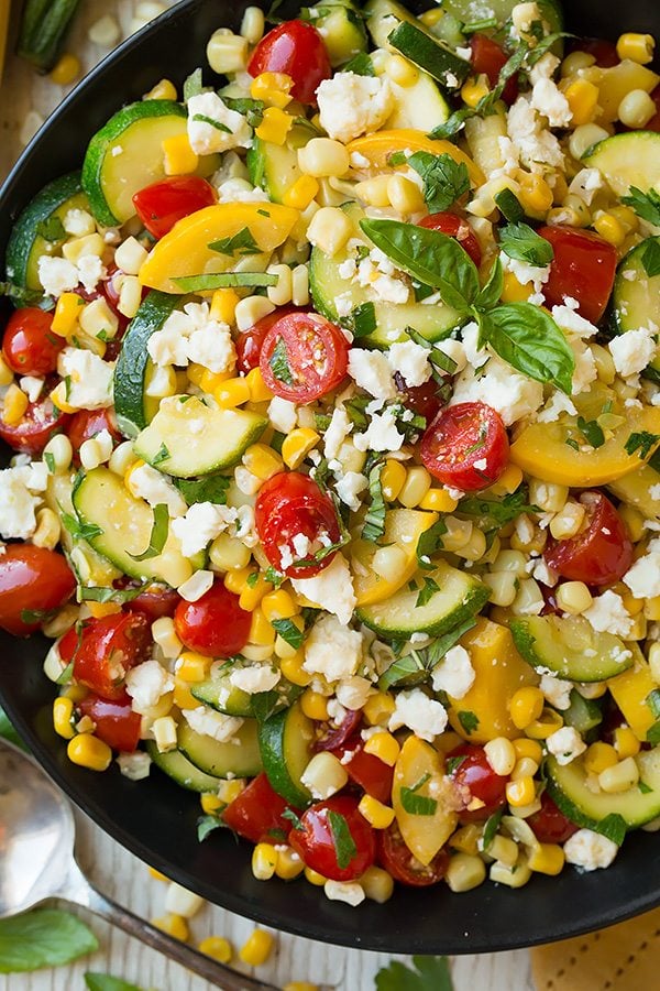 Summer Harvest Salad Zucchini and squash salad in a black serving bowl.