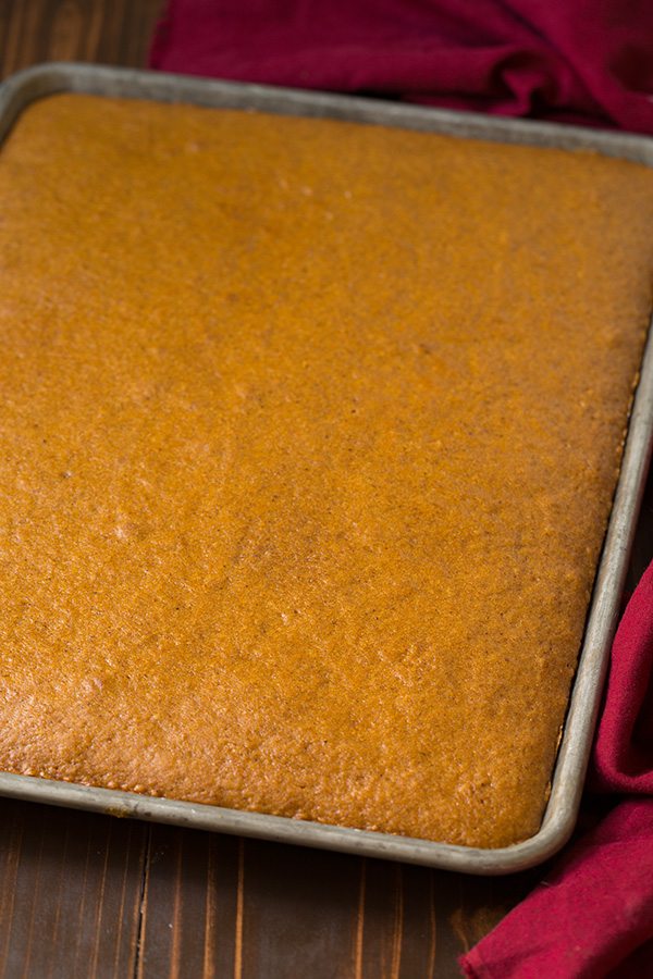 Pumpkin Cake with Cream Cheese Frosting Pumpkin cake cooked in a sheet pan.