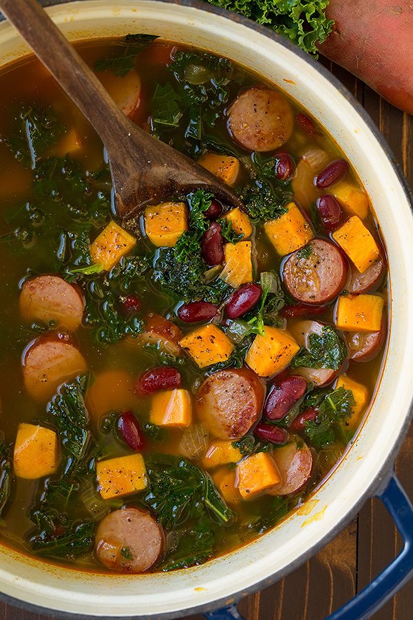 Turkey Sausage Kale and Sweet Potato Soup Turkey Sausage, Kale and Sweet Potato Soup in a large blue pot.