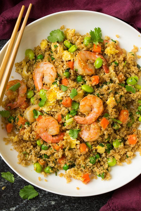 Quinoa Shrimp Fried Rice Shrimp fried rice with quinoa in a white serving bowl.