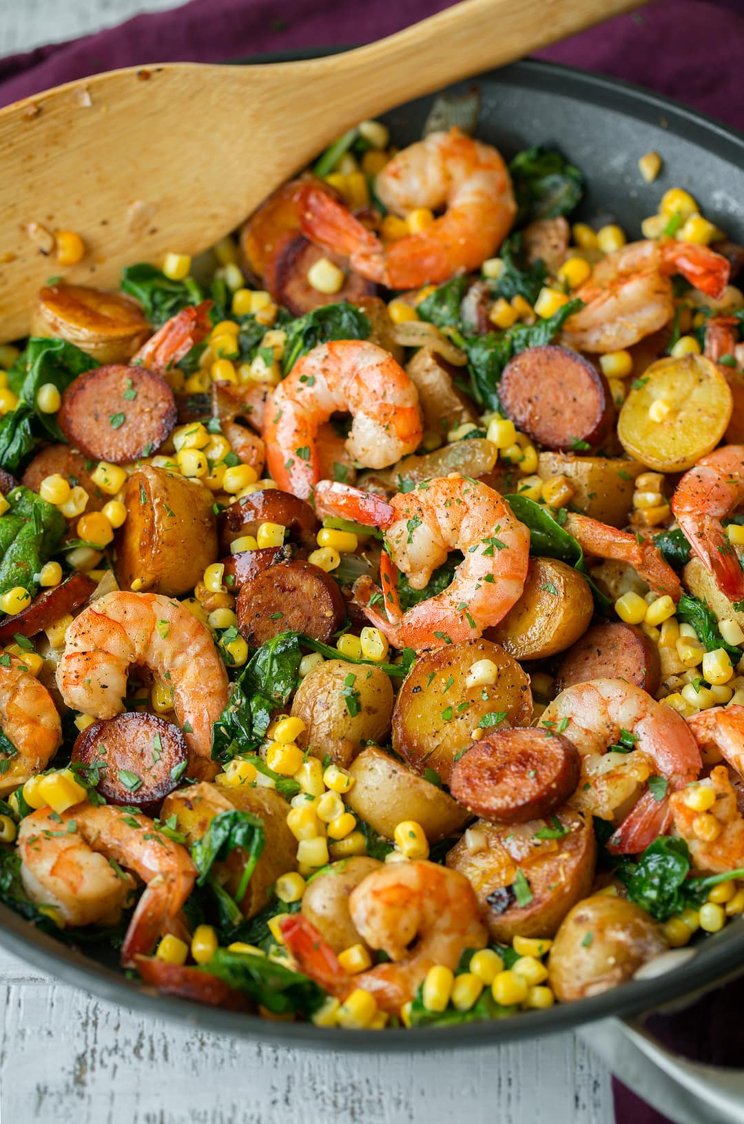 Shrimp Boil Shrimp Boil that includes shrimp, potatoes, corn, sausage, old bay seasoning, spinach and lemon