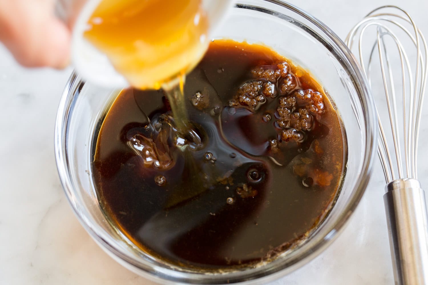 Korean Beef Bowls Making a soy sauce mixture for beef.
