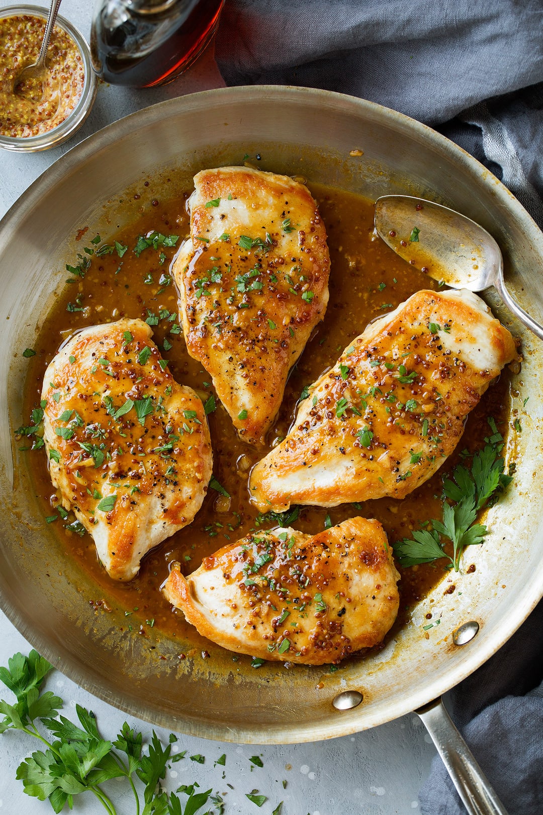 Skillet Chicken with Maple Mustard Sauce shown here in stainless steel 12-inch skillet.