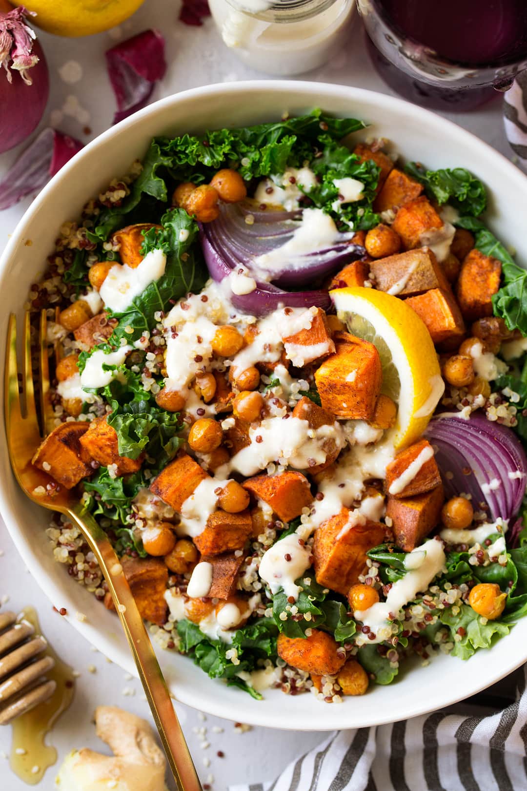 Buddha Bowl with Sweet Potatoes Chick Peas and Ginger Tahini Sauce