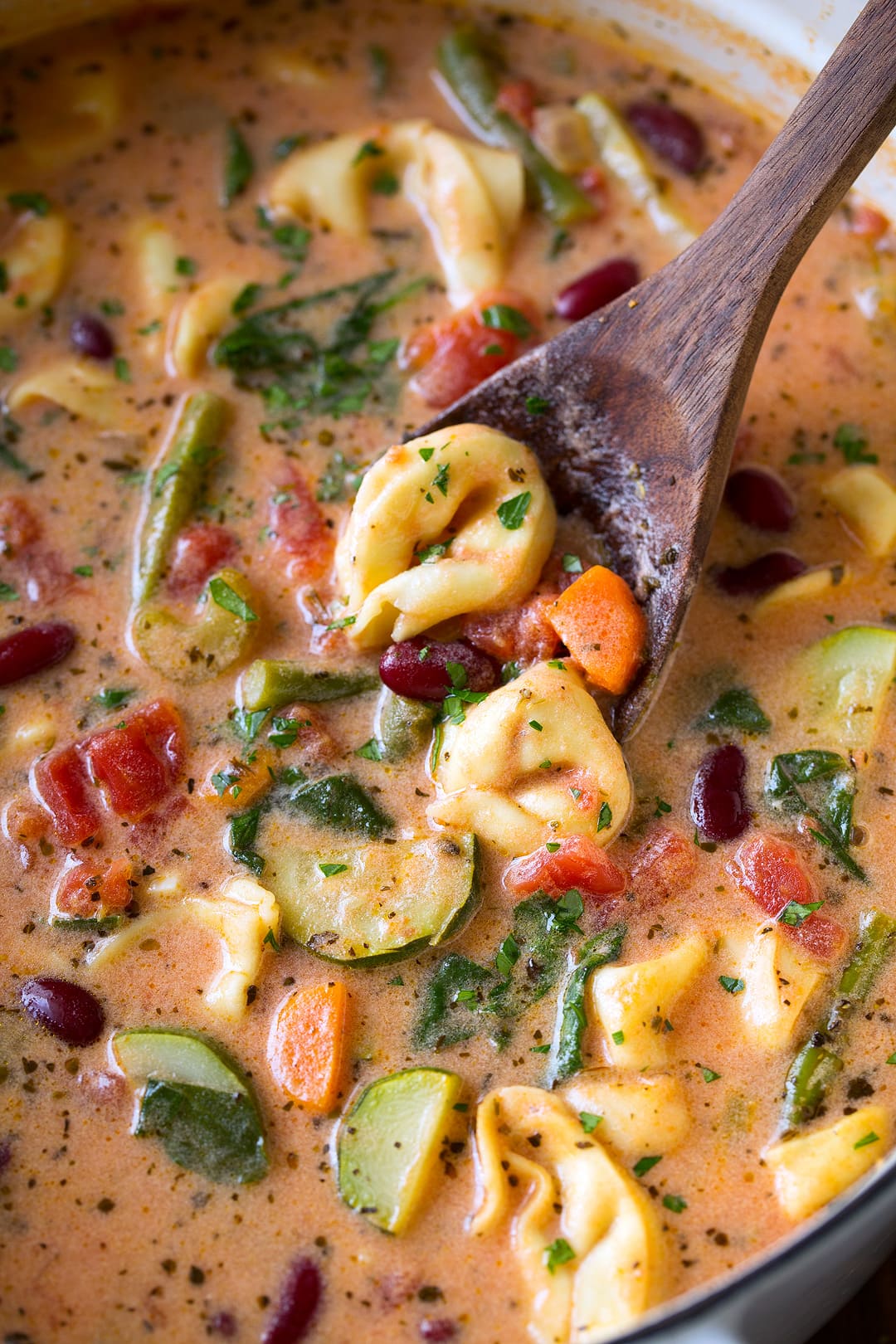 Minestrone Soup with cheese tortellini, vegetables and kidney beans.