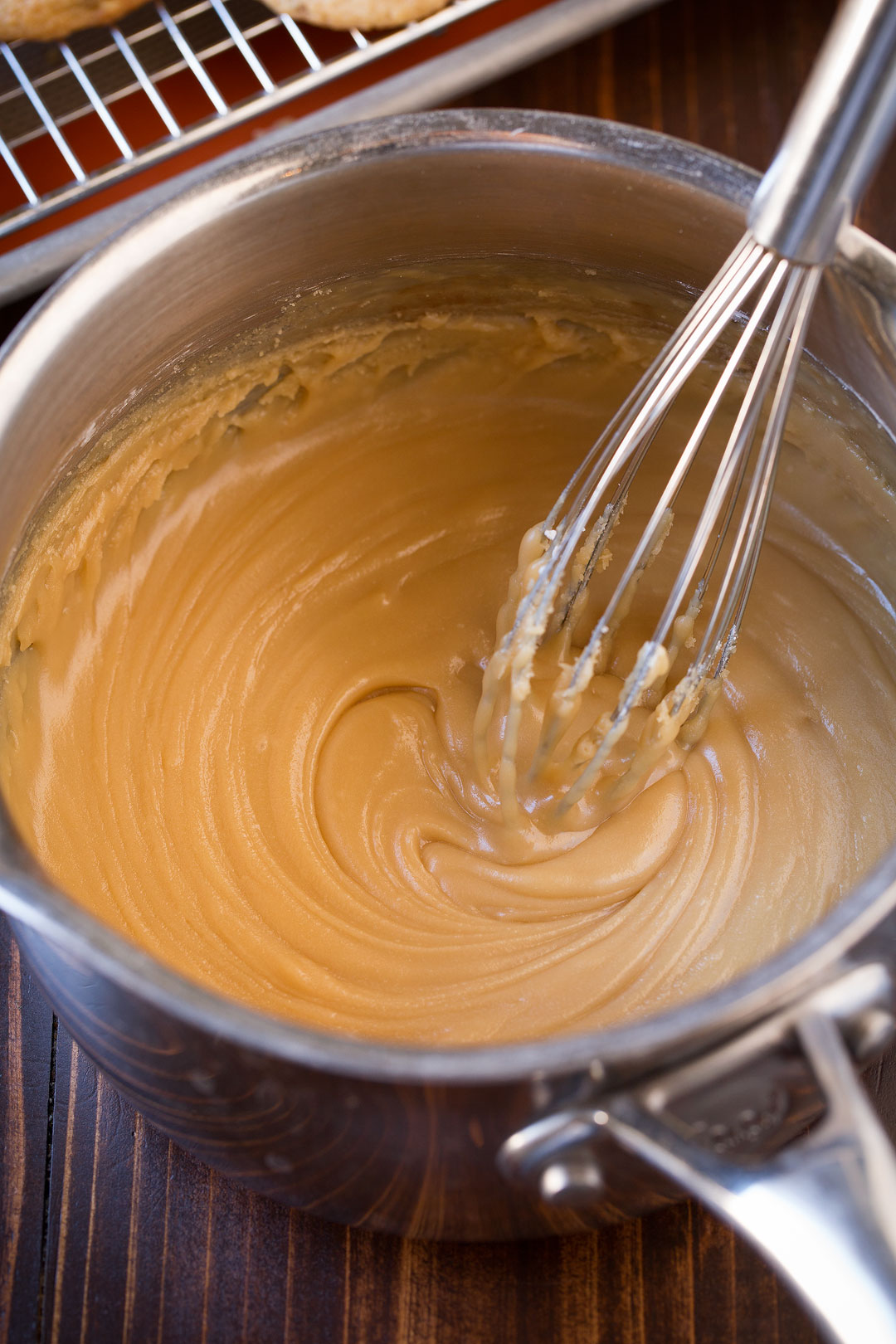 Pecan cookie icing in a medium stainless steel saucepan