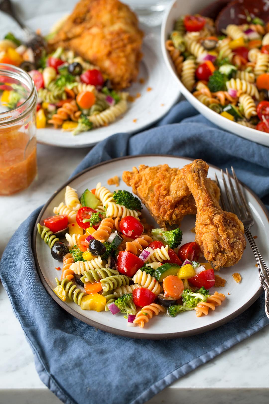 Garden Pasta Salad Garden Pasta Salad on a plate with fried chicken