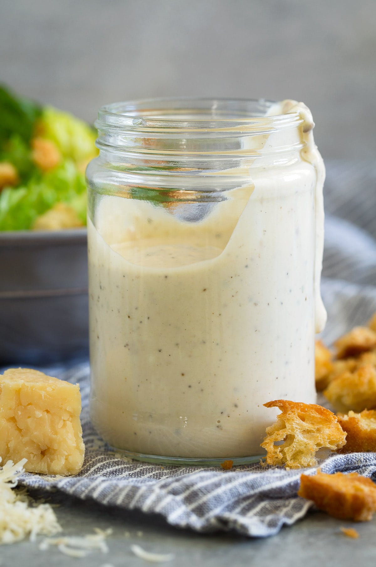 homemade caesar dressing in glass jar