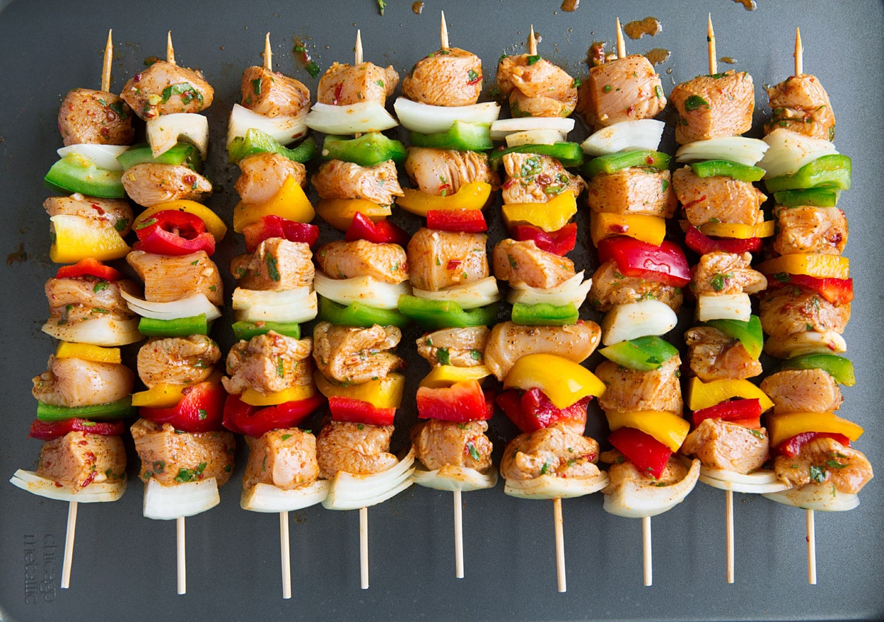 kebabs before grilling on sheet pan