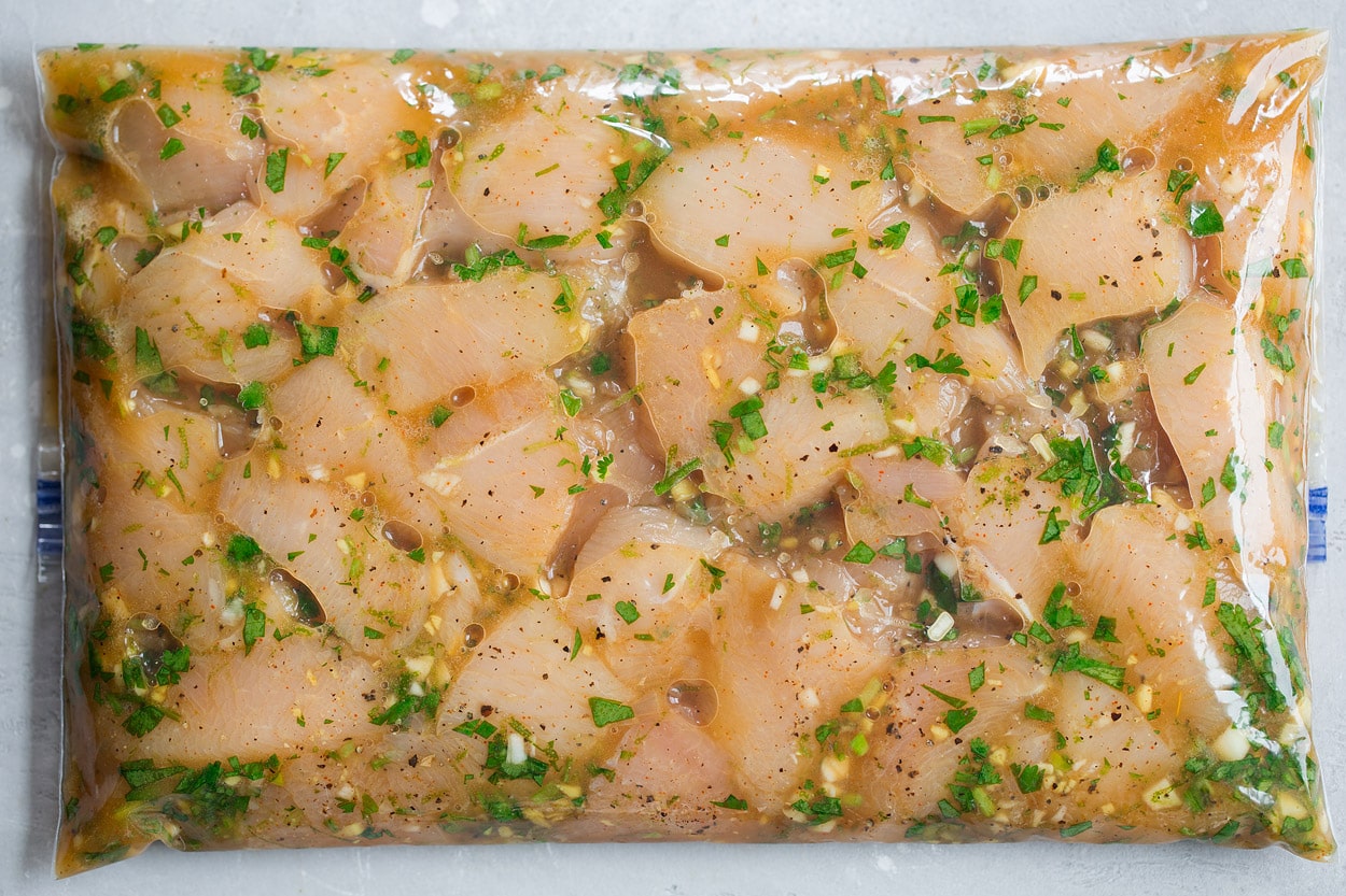 honey lime chicken skewers marinating in bag