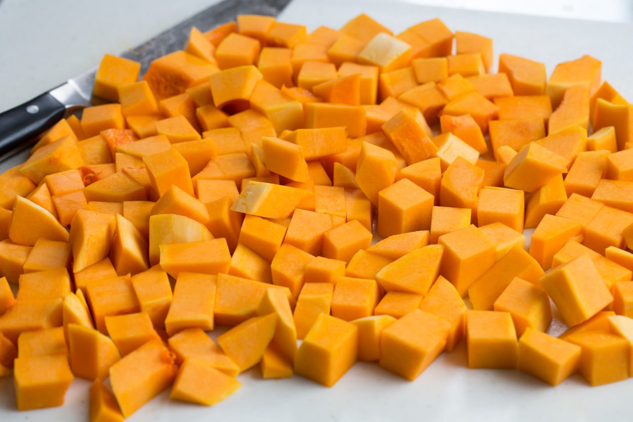 Roasted Butternut Squash with Garlic and Herbs Completed chopped butternut squash in cubes.