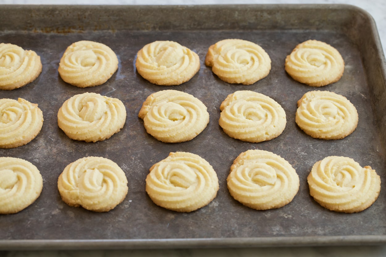 Butter Cookies Butter cookies on a baking sheet after baking.