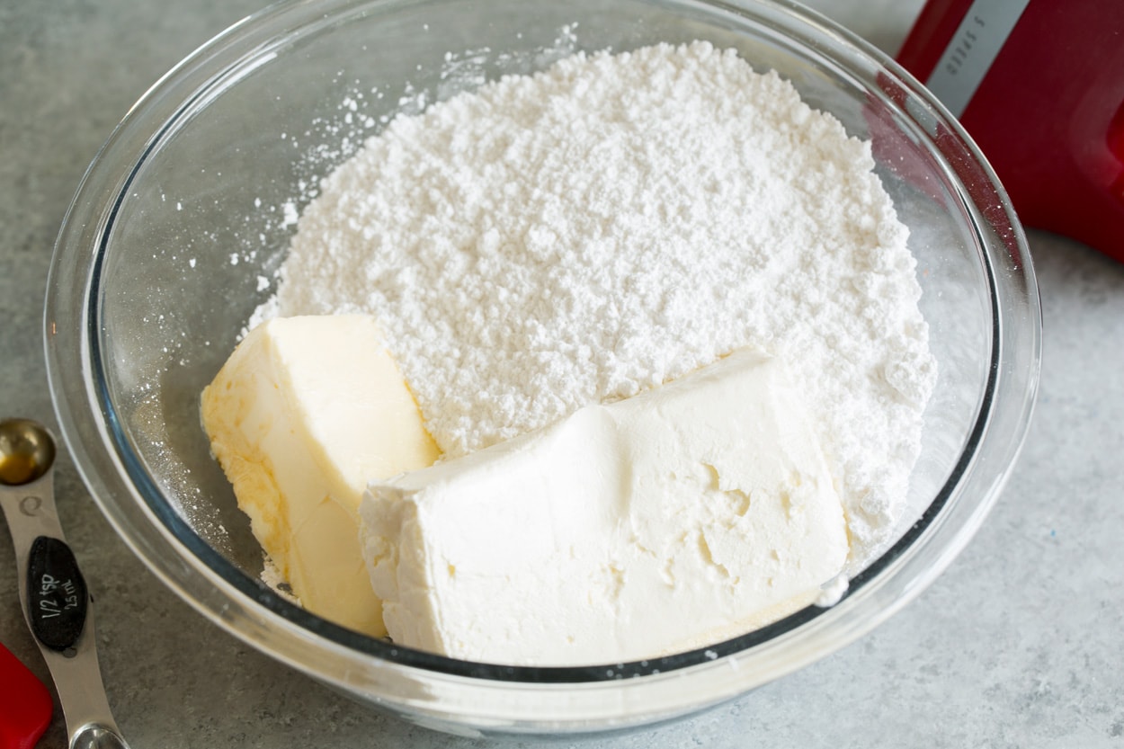 Pumpkin Cake shown here making cream cheese frosting