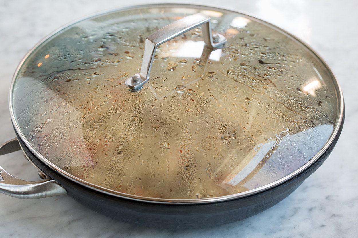 Chimichurri Beef and Rice Chimichurri Beef and Rice resting in covered skillet on countertop off heat.