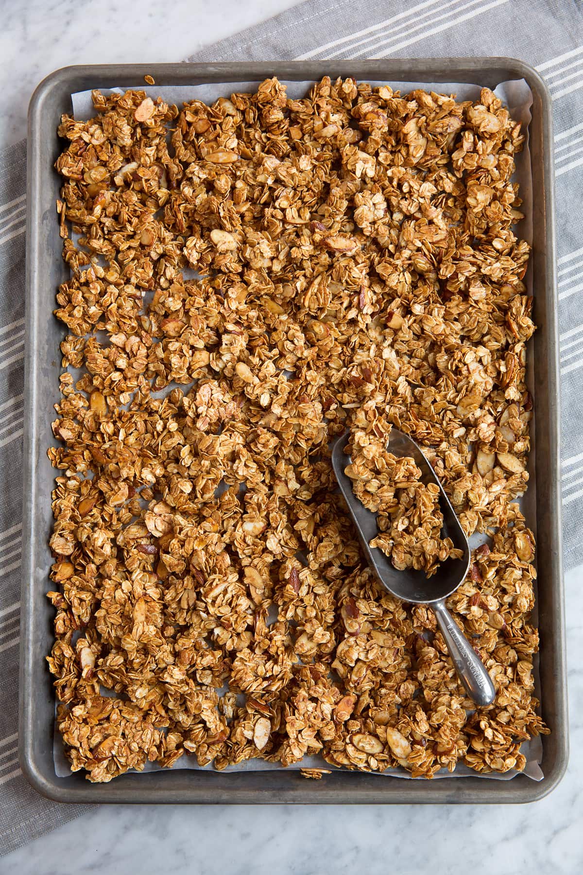 Homemade Granola Recipe Granola on baking sheet after baking.