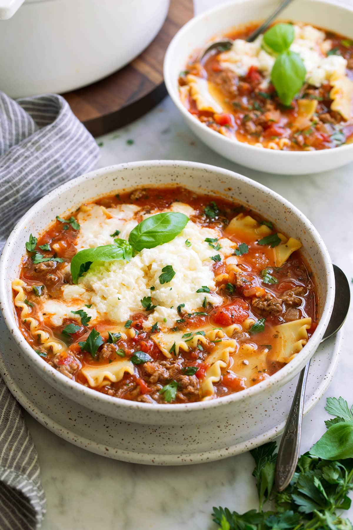 The Best Lasagna Soup Recipe! Two individual servings of lasagna soup.