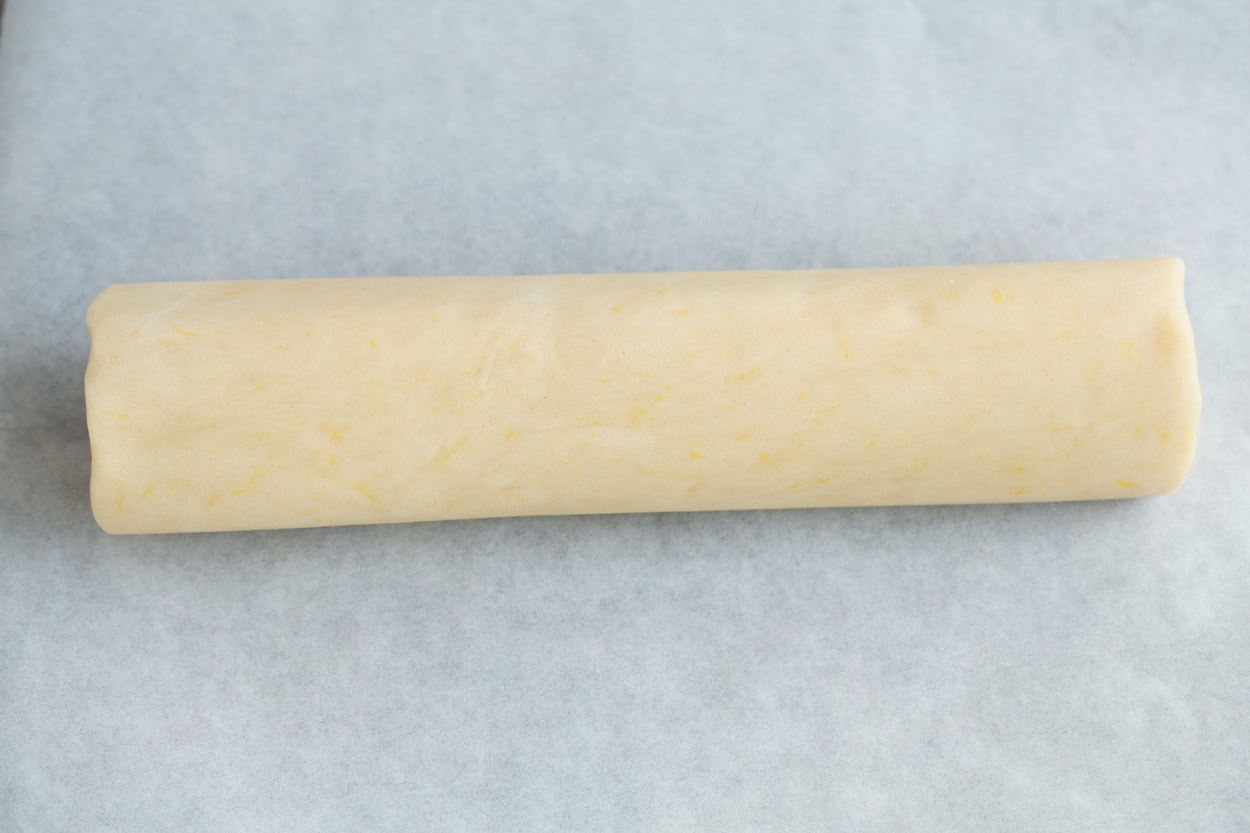 Lemon Shortbread Showing how to make lemon shortbread cookies. Rolling dough into a log.