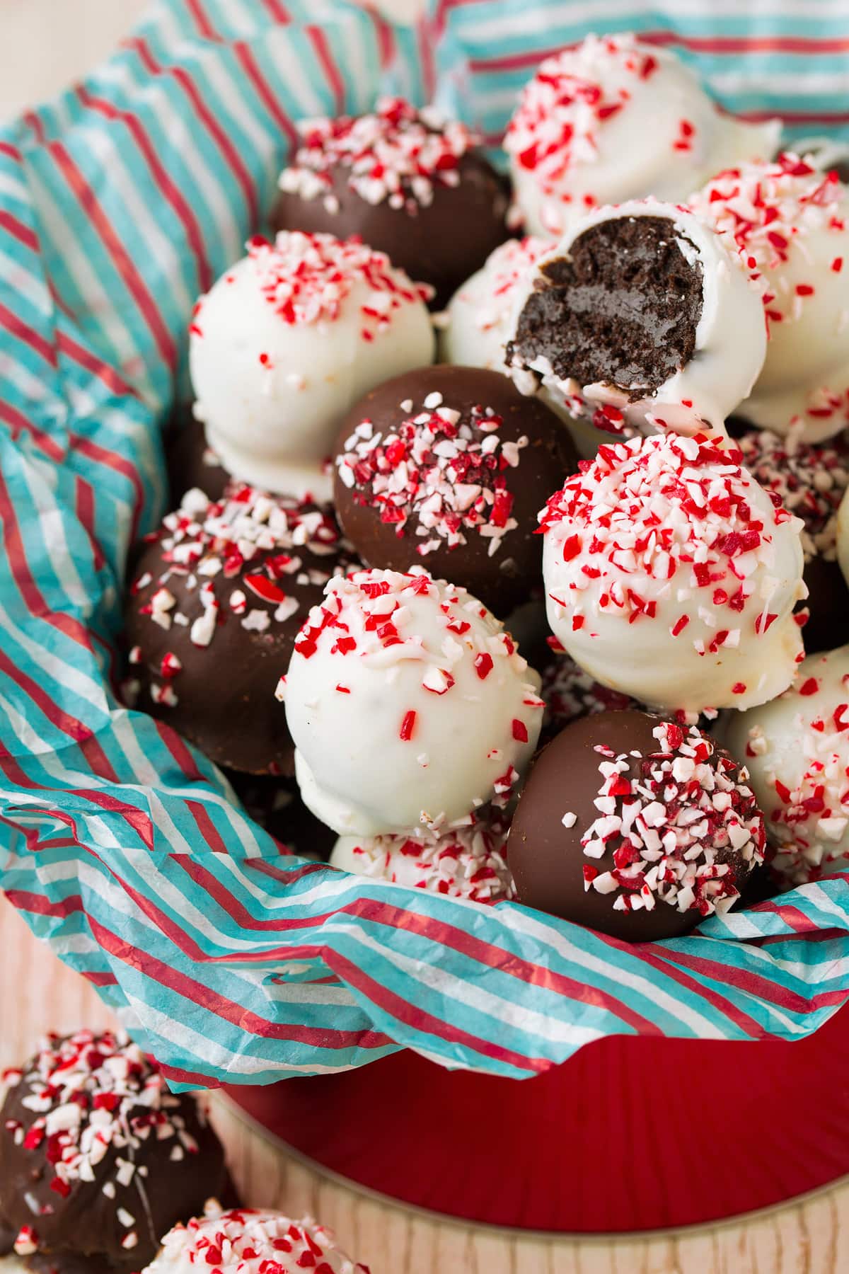 Peppermint Oreo Truffles Peppermint Oreo Truffles in a metal Christmas tin.