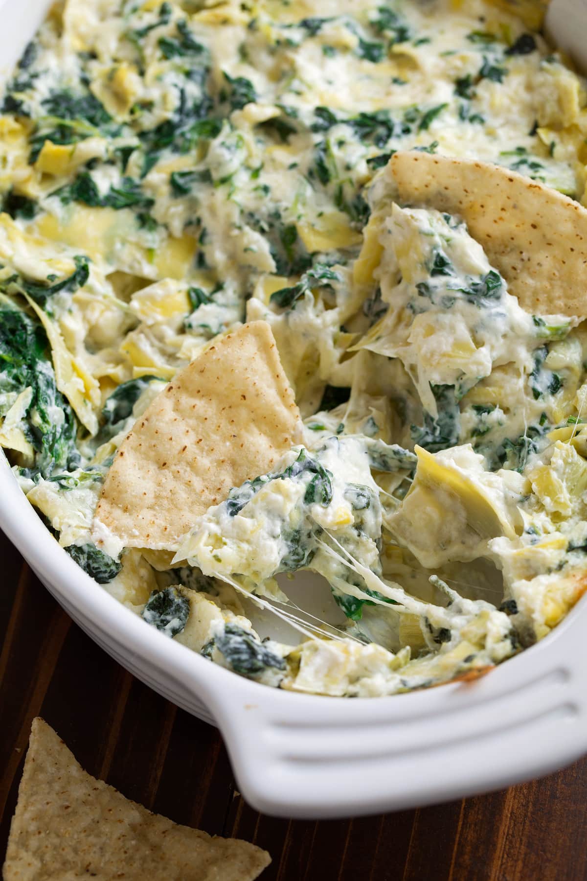 Spinach Artichoke Dip Spinach Artichoke Dip in baking dish.