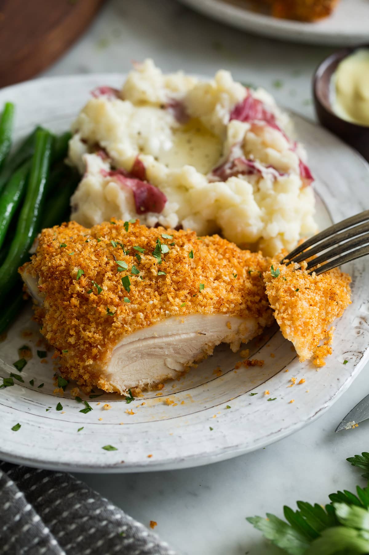 Oven Fried Chicken Slicing into a piece of Oven Fried Chicken