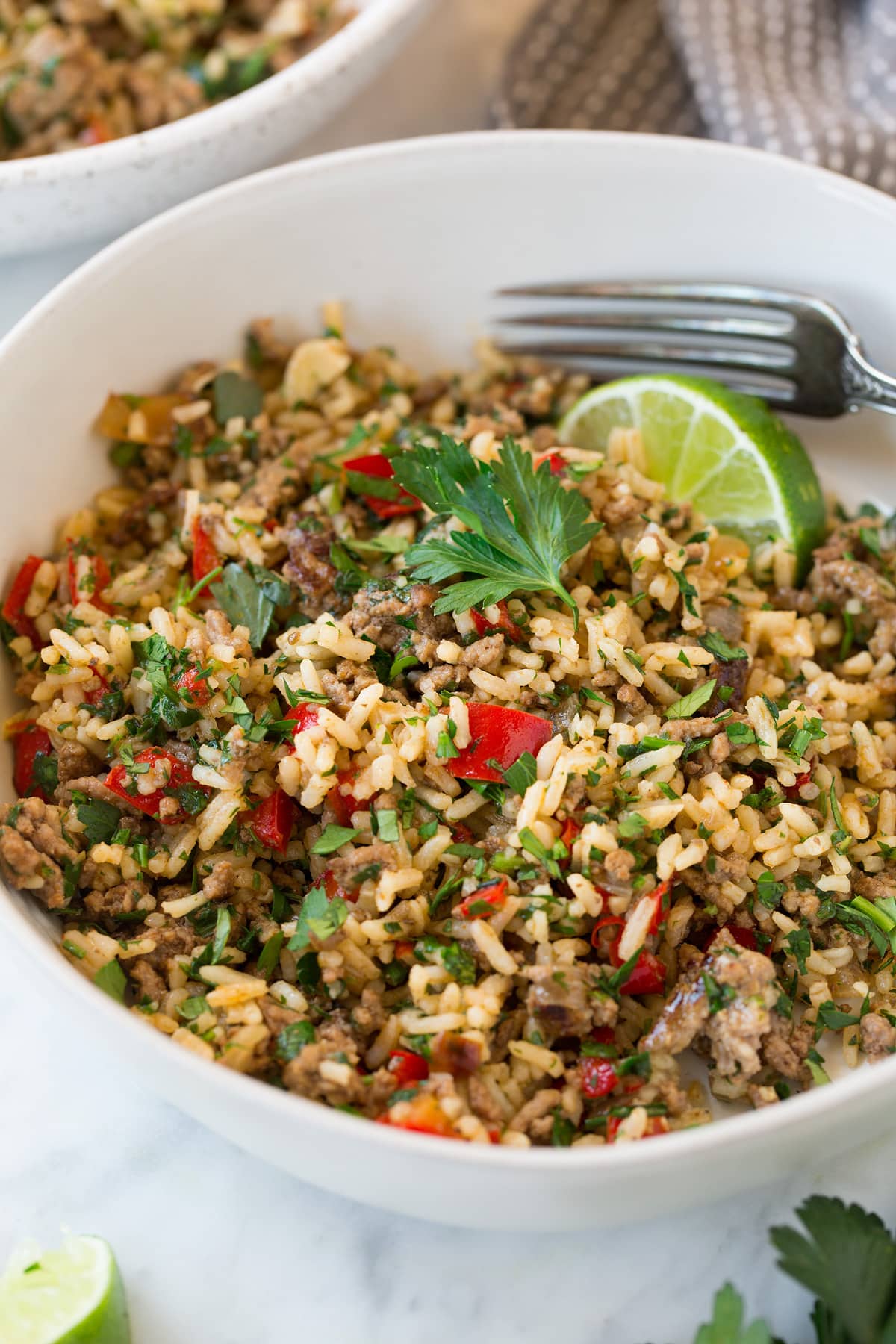 Chimichurri Beef and Rice Chimichurri Beef and Rice in a white serving bowl set over a marble surface.