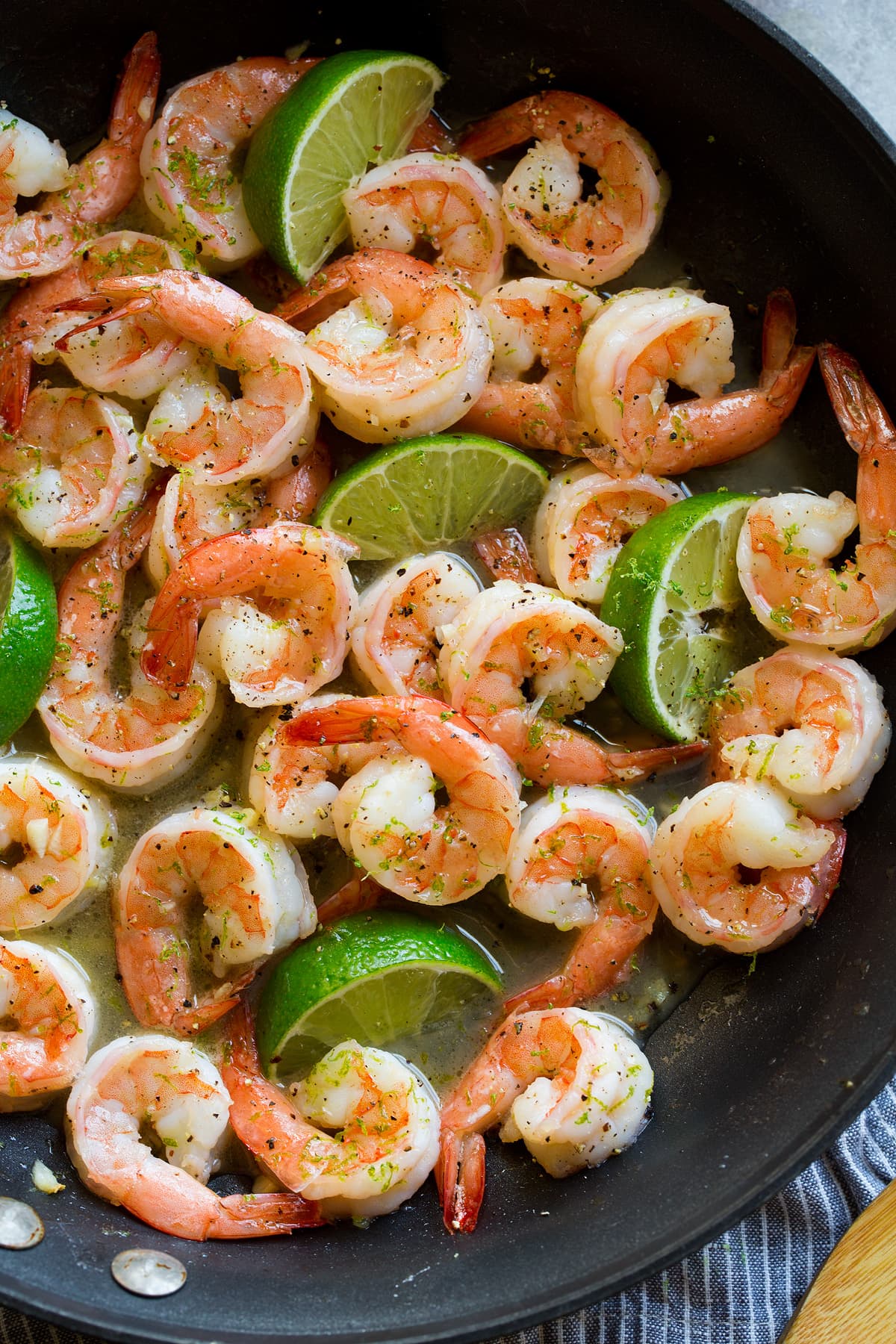 Shrimp with Honey Lime Sauce Shrimp with honey lime sauce in a black skillet.