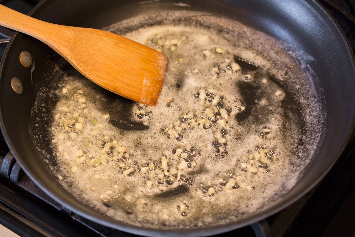 Shrimp with Honey Lime Sauce (Only 5 Ingredients!) Melting butter and garlic in skillet.