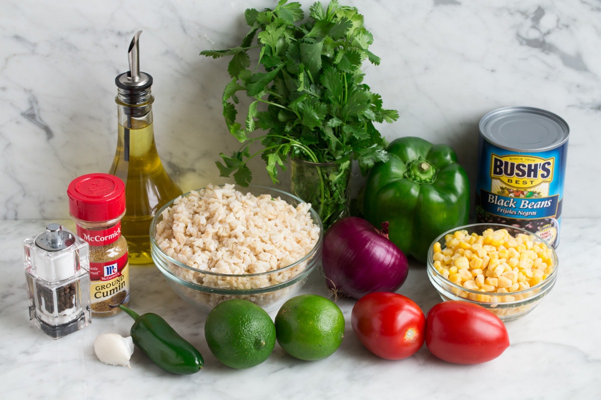 Fiesta Rice - healthy, easy and so flavorful! Perfect side to seafood, chicken and Mexican dishes. Or just eat it on it's own, it's so filling! #rice #ricerecipe #mexican #blackbeans Ingredients needed to make fiesta rice.