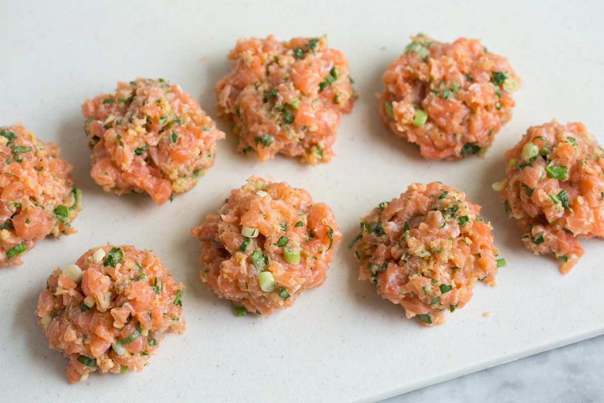 Crispy Salmon Patties (made with fresh salmon, not canned!) Salmon patty mixture divided into eight equal portions.