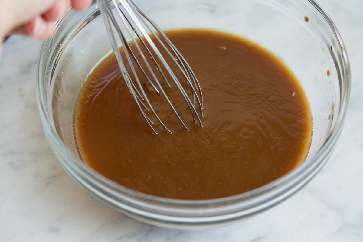 Beef and Broccoli - this is a staple dinner recipe! Easy, flavorful and sure to satisfy! #beef #broccoli #chinese #recipe Making sauce for beef and broccoli.