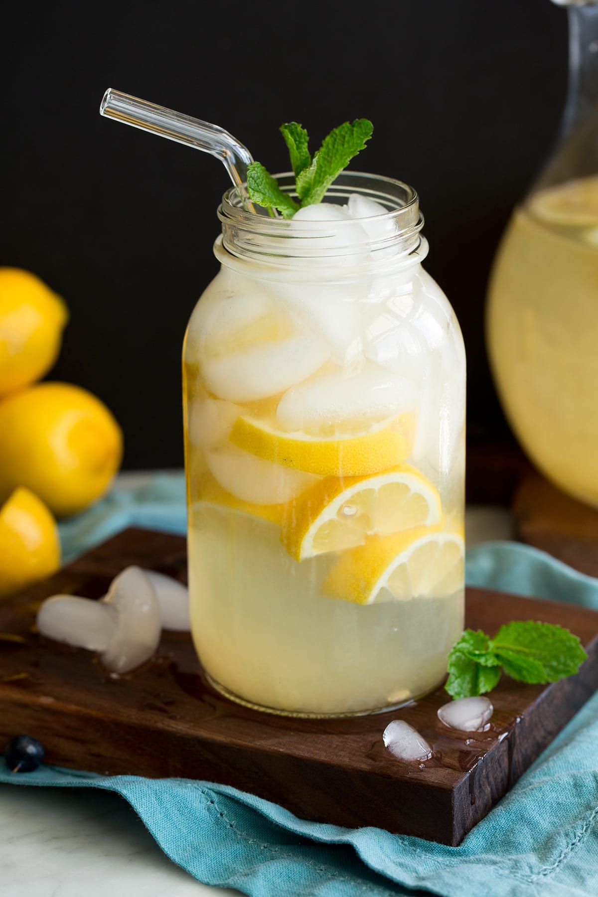 Homemade Fresh Lemonade Glass jar full of lemonade and ice.