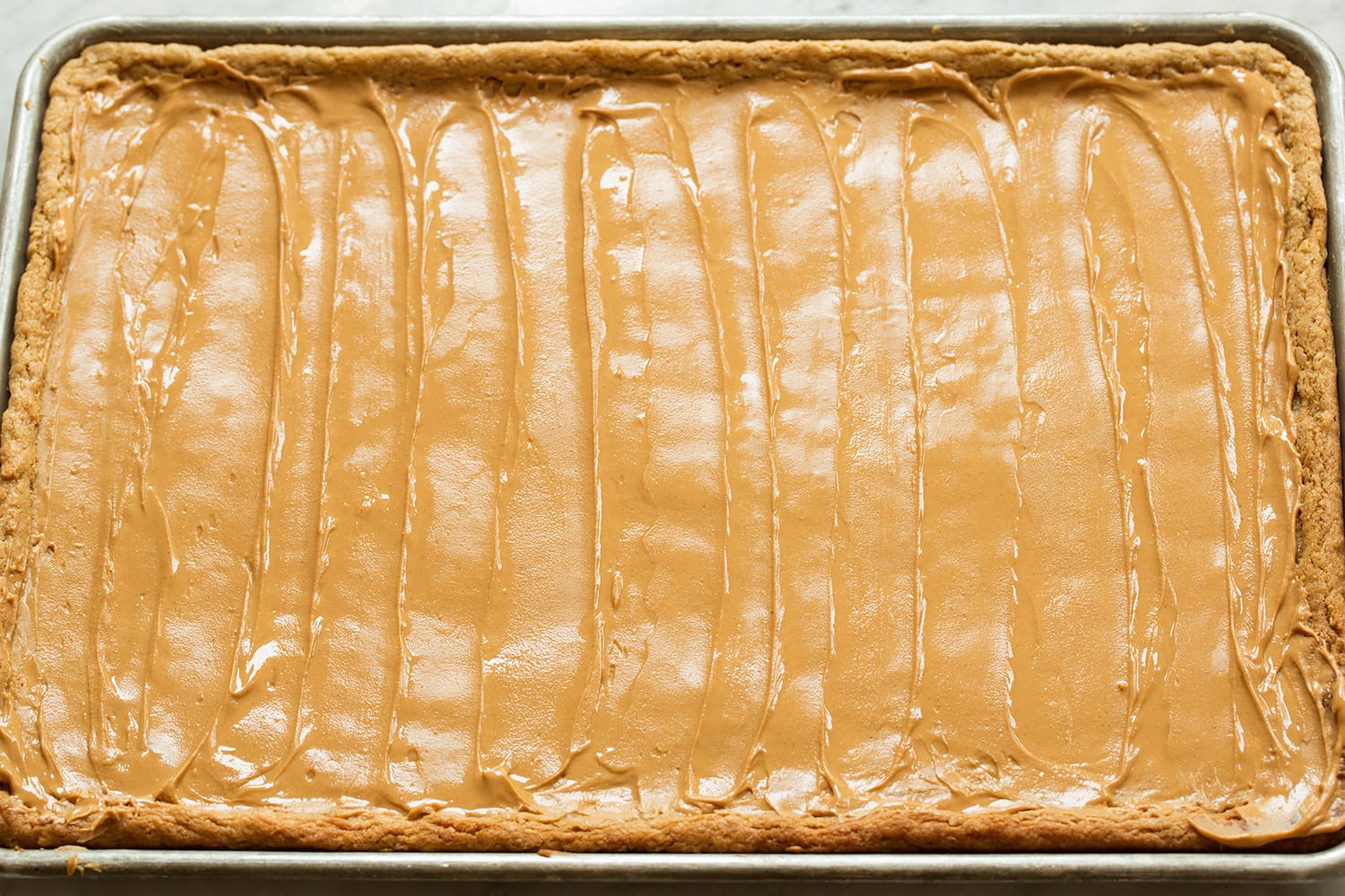 Peanut Butter Bars Peanut butter spread over cookie bars.