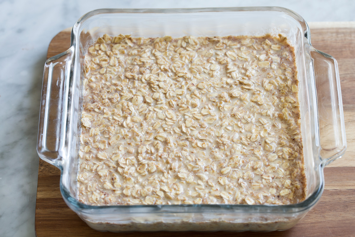 Baked Oatmeal Baked oatmeal mixture in glass baking dish before baking.